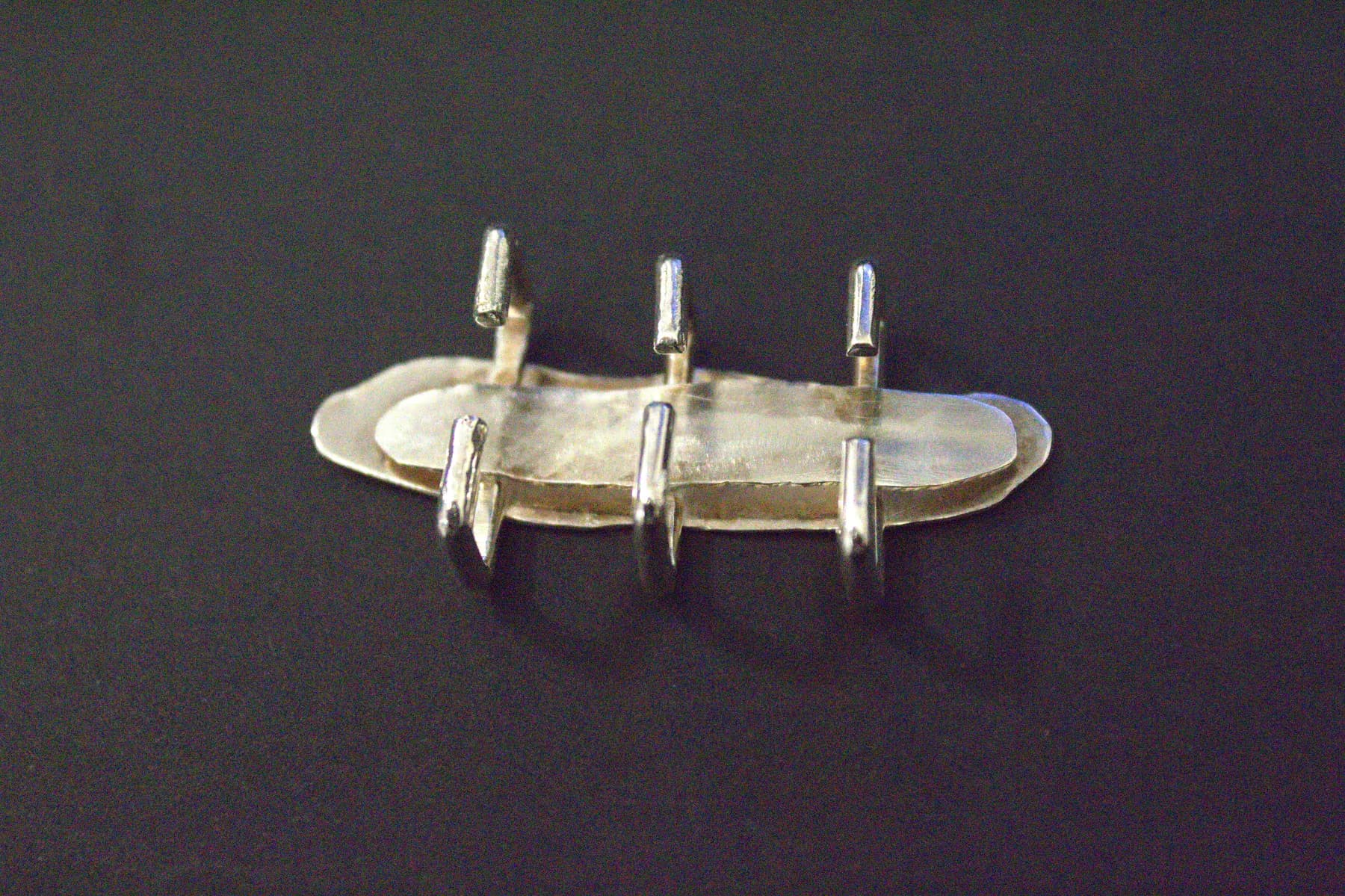 Handmade silver skeleton charm